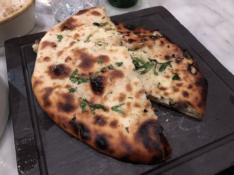 Fresh naan bread served with curry