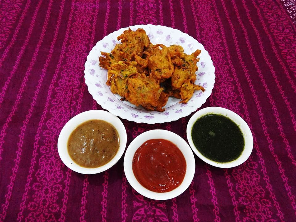 Onion bhaji starter with chutneys
