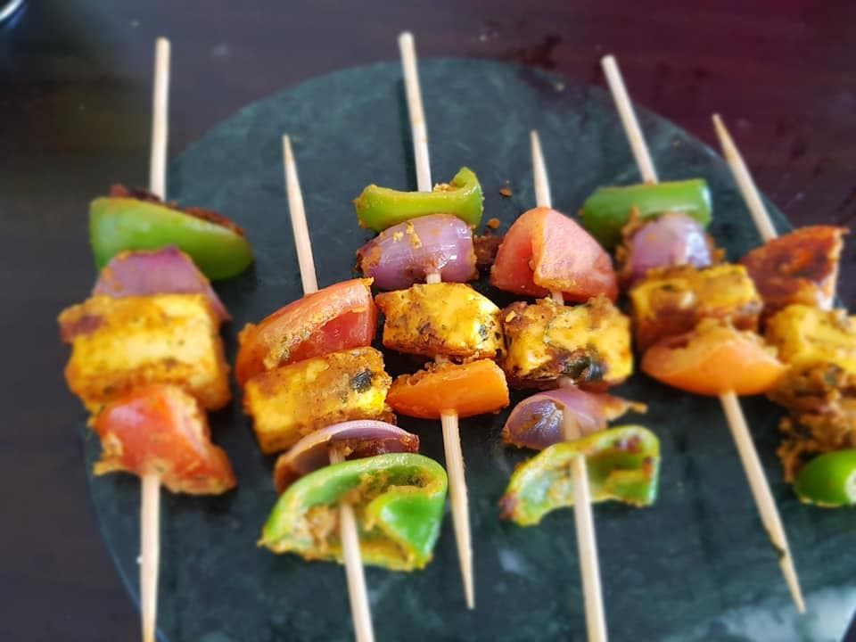 Paneer shashlik skewers with peppers and onions